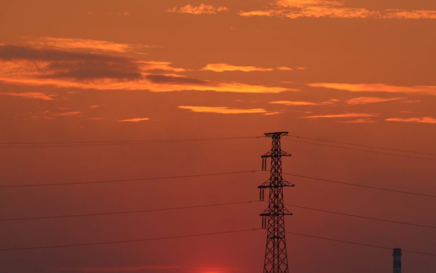 Transmission towers at sunset